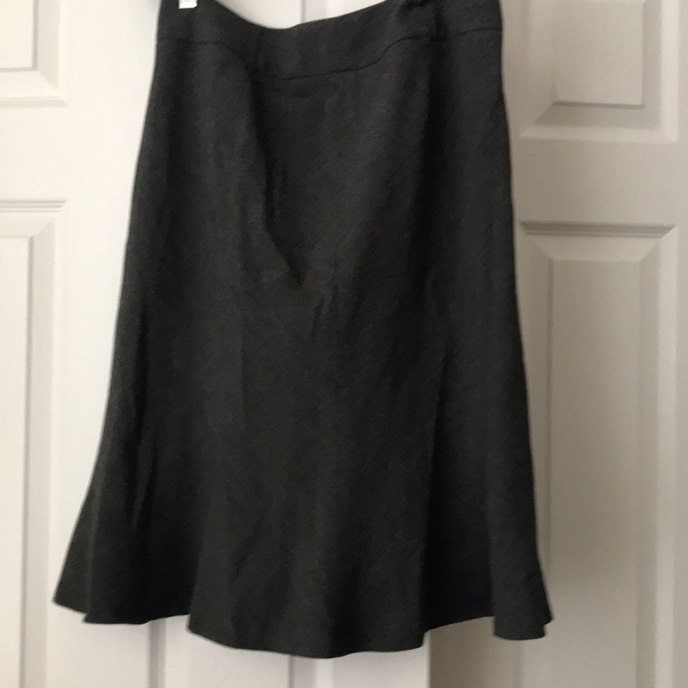 Black skirt with little white line on it